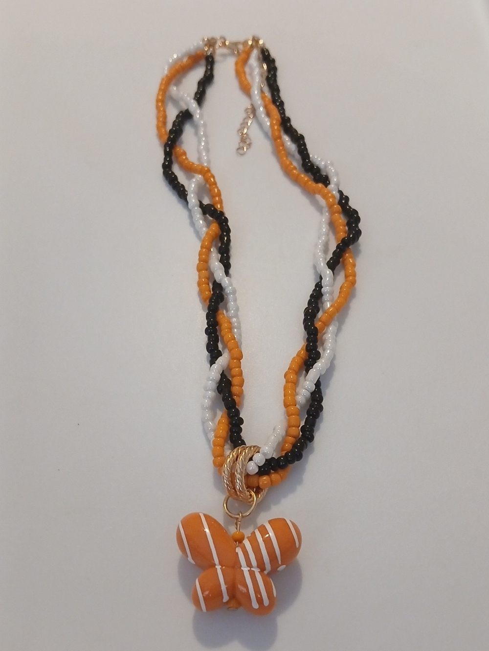 Fashion Jewelry Orange, Black & White Beaded Necklace with Butterfly Pendant